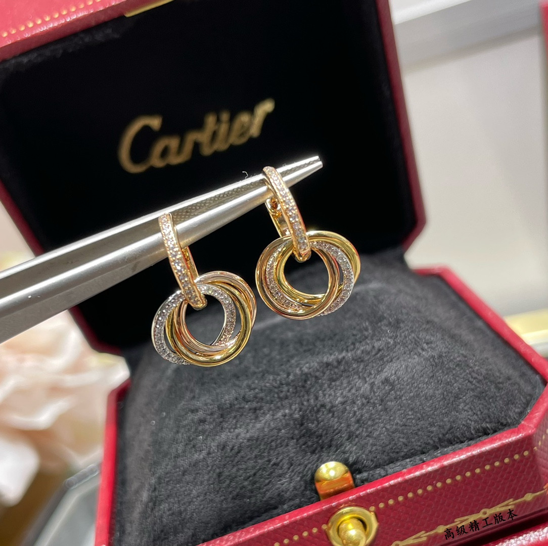 ca*t*er small size triple-ring Di*m*nd earrings