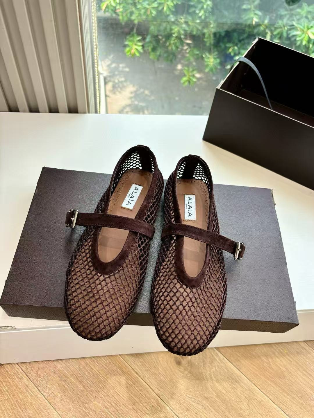 UA ALAÏA BALLET FLATS IN FISHNET