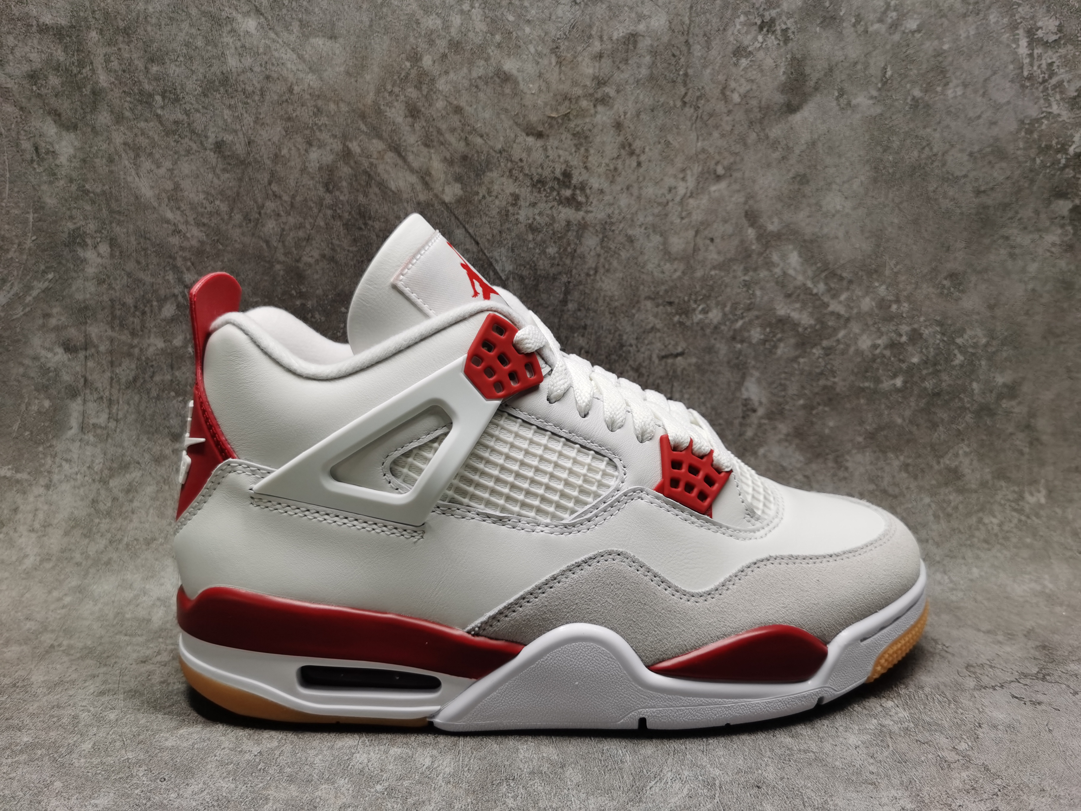 UA Jordan 4 Retro SB