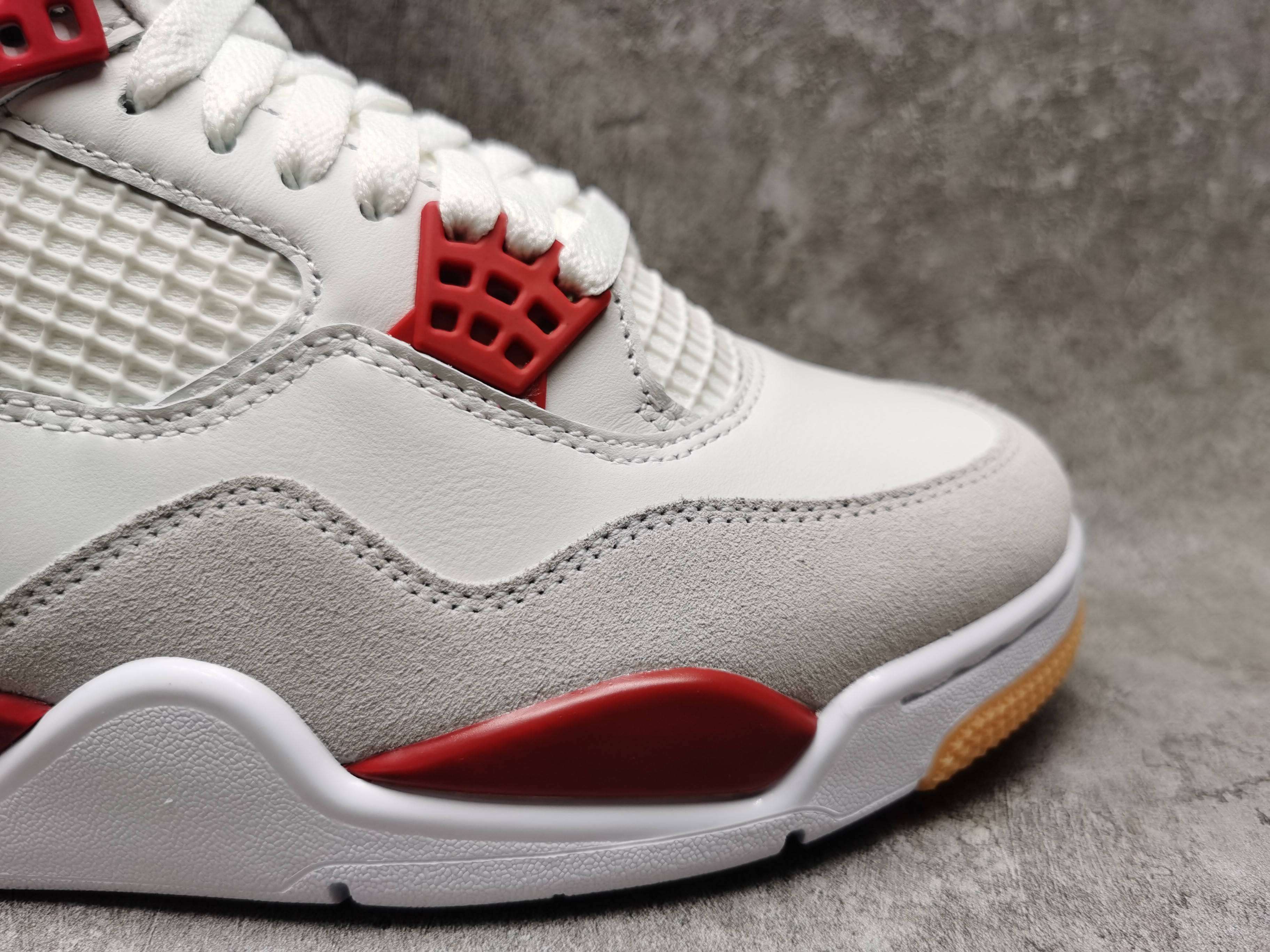 UA Jordan 4 Retro SB