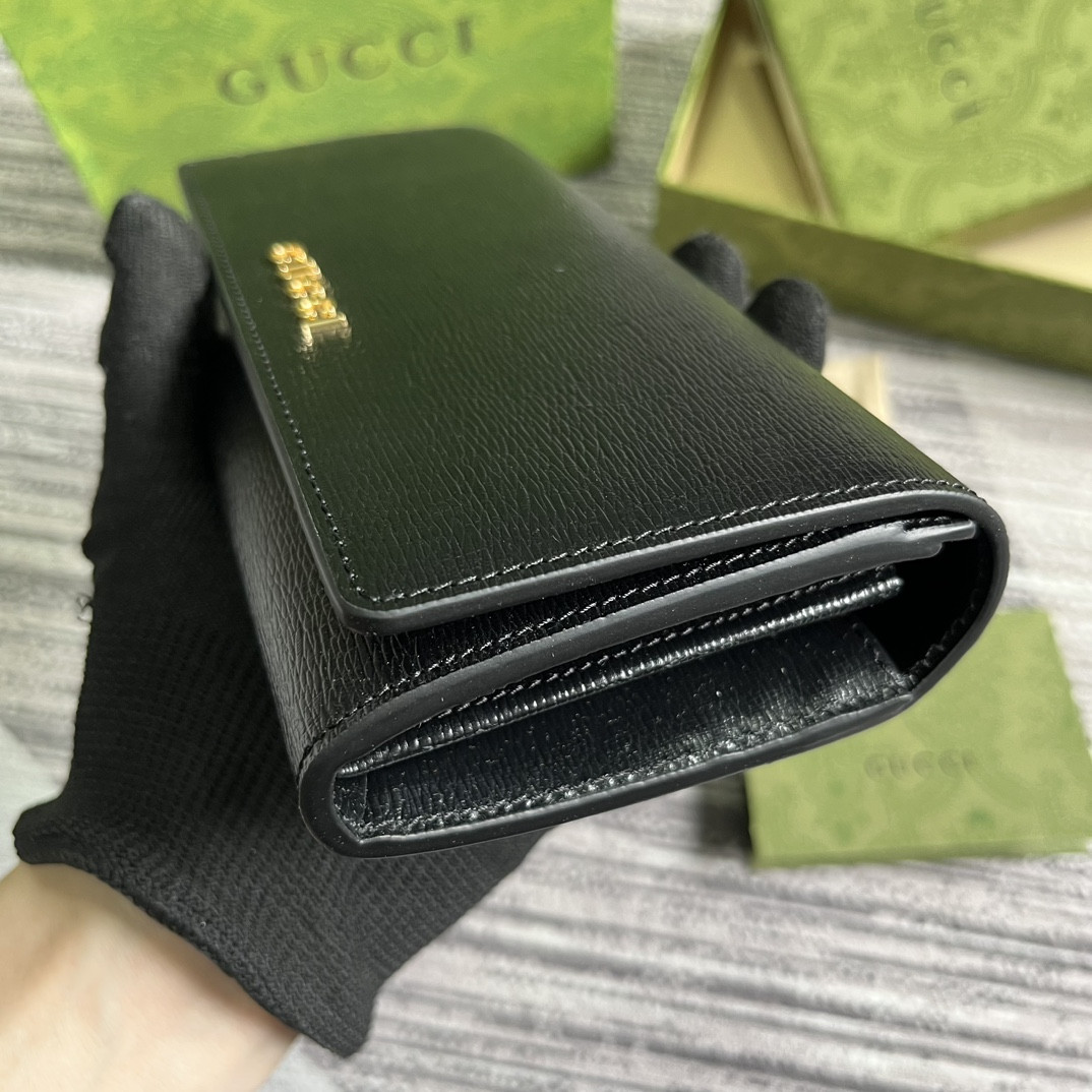 continental wallet with G*u*i script 7.5"w x 4"h x 1.4"d