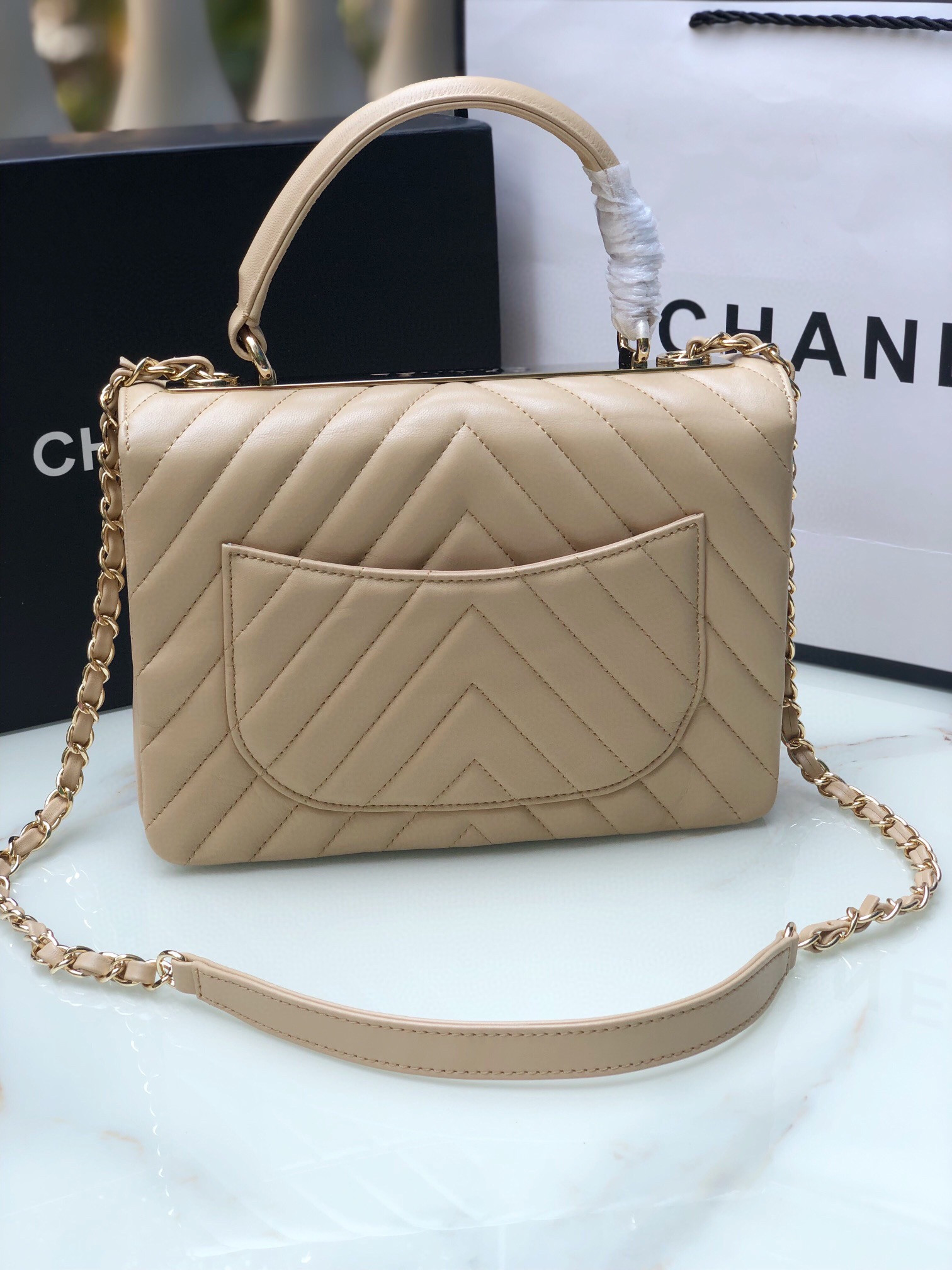Ch*el flap bag with top handle beige 6.6 × 9.8 × 4.7 in