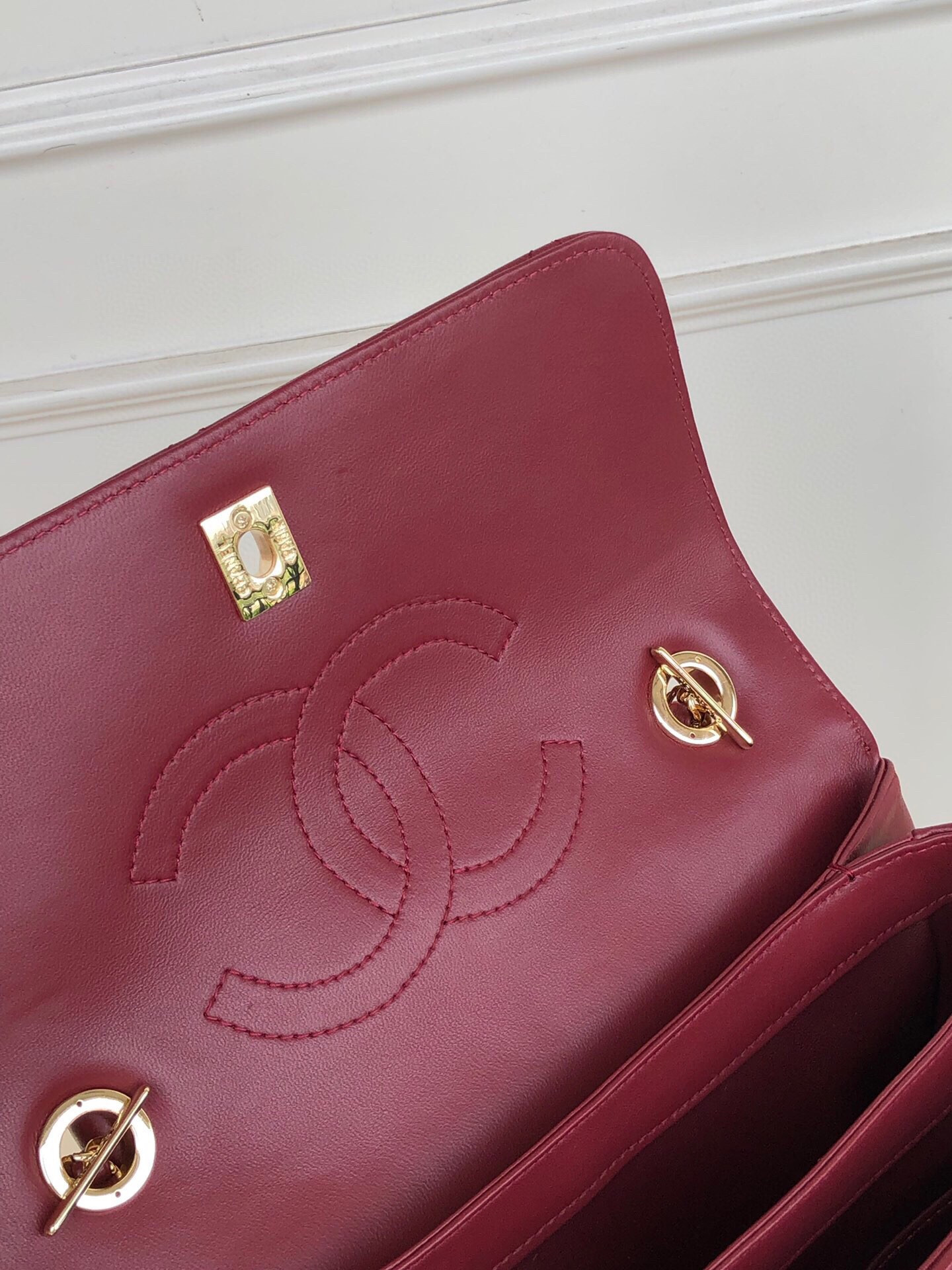 Ch*el flap bag with top handle 6.6 × 9.8 × 4.7 in