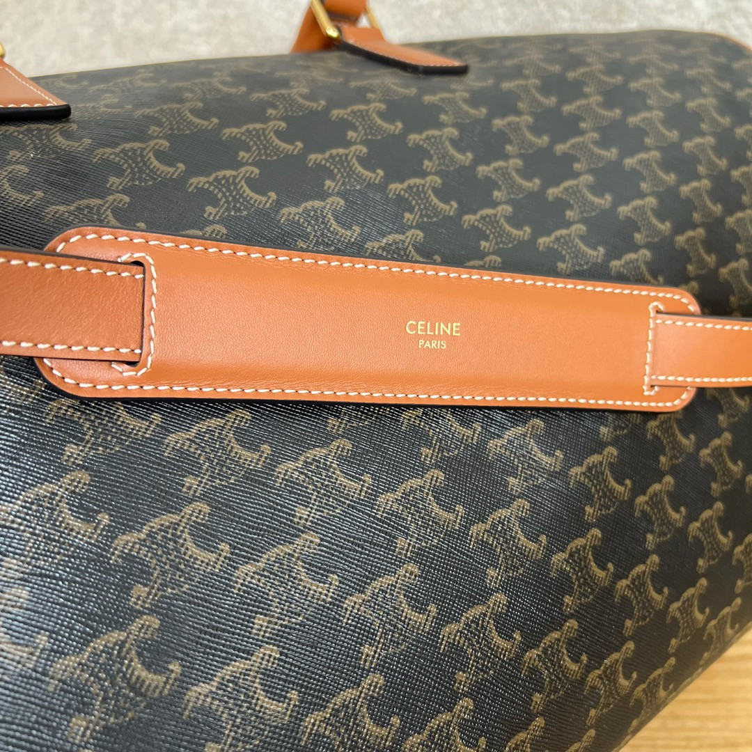 Ce**e large travel bag in triomphe canvas with Ce**e print 50x27x23cm